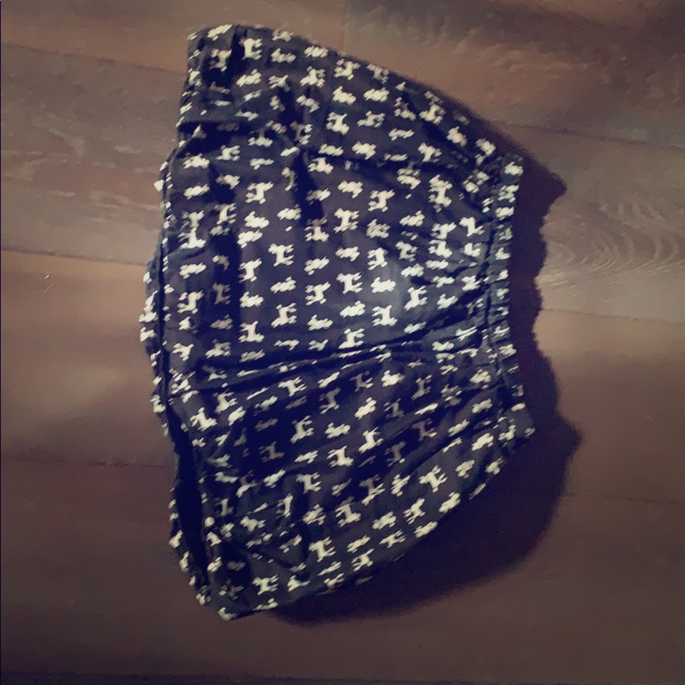 Full black skirt with white poodles.